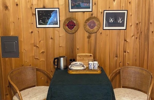 West Glacier Cottage | Inside Glacier National Park, Walsh Cottage on the shores of Lake McDonald
