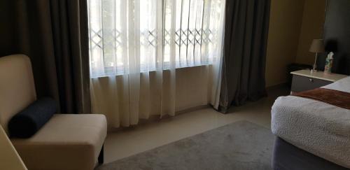 Blantyre Apartment | InstaHomes by Tru - Hillside Suite