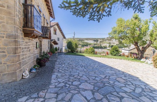 Senegue House | Intimate Retreat in the Pyrenees Garden & Parking