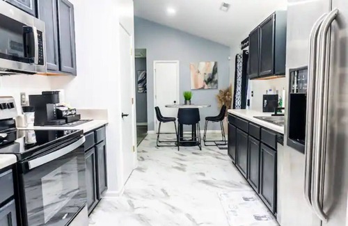 Greensboro House | Intimate stay&private community w/theatre room mins from downtown&close to lake!