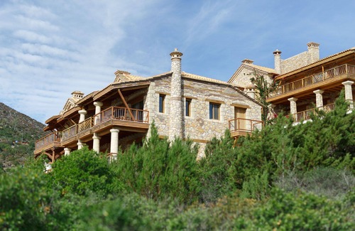 Arkadiko Chorio Apartment | Into The Blue Maisonette: A beautiful stone house on the beach!