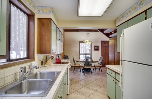Black Butte Ranch Cabin | Inviting cabin with fireplace, pool, tennis court, and private hot tub