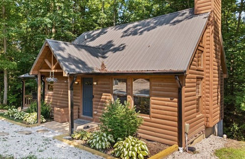 Rogers Cabin | Inviting, charming 2BR, log cabin located in the Scenic Heights neighborhood.