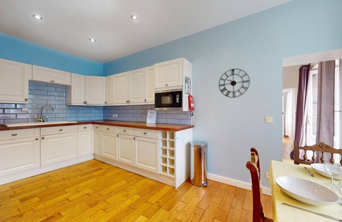 Desertines House | Inviting cottage with indoor community pool and activity room.