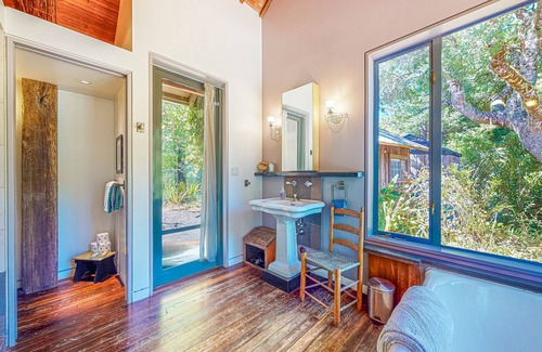 Occidental House | Inviting dog-friendly home with hot tub, fireplace, charming patio, & W/D
