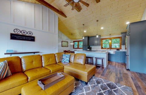 Penrose House | Inviting home with game room, firepit, full kitchen, central AC, & W/D