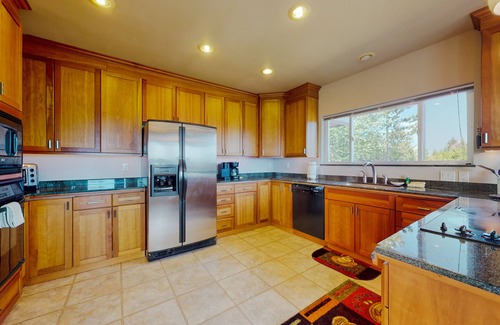 Union House | Inviting home with hot tub, water view, fireplace, pool table, & W/D