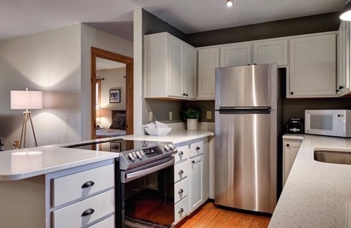 Glenville House | Inviting house near Lake Glenville with firepit, fireplace, grill, porch, & deck