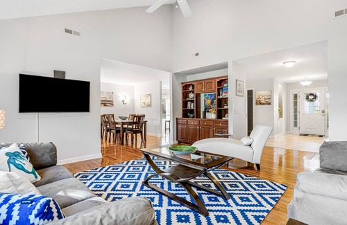 St. James House | Inviting house with nearby golf courses, charming patio, washer/dryer, AC