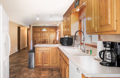 Harrison House | Inviting lakefront home with dock, fireplace, mountain view, & W/D
