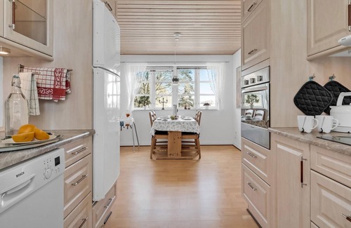 Sabro Apartment | Inviting vacation home with wood stove and grounds, located in a cozy town outside Arhus.