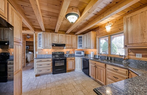 Huddleston Cabin | Inviting waterfront cabin with hot tub, kayaks, and beautiful sunsets