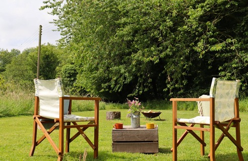 Swannington Cabin | Iris, peaceful and hidden away in rural Norfolk amongst wild flowers.