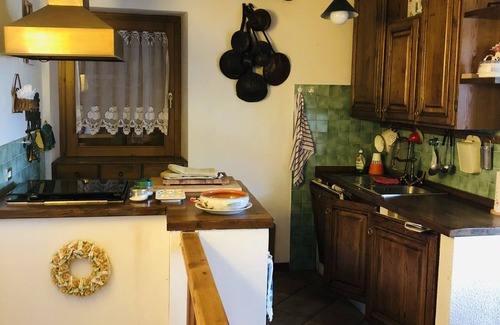 Pellizzano Cabin | iRIVAS Lodge with views of the Dolomites in a historic village dating back to the 1300s