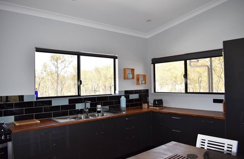 Dimbulah House | Ironbark House Dimbulah: Boutique Two Bedroom House looking over the Outback