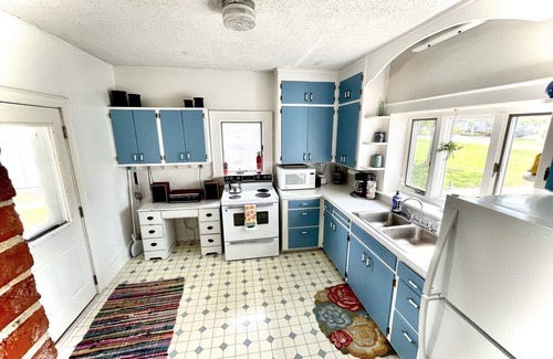 East Jordan House | Ironton Shore Farms: 4 Bedroom Farmhouse on Lake Charlevoix with Beach and dock