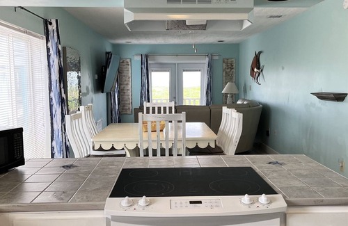 East End Condo | ISLAND CLUB- East End OCEANFRONT Ground Level unit with gazebo and OCEAN VIEW