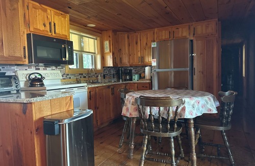 Fort Kent Mills House | Island Escape on Long Lake with beautiful views on Long Lake.