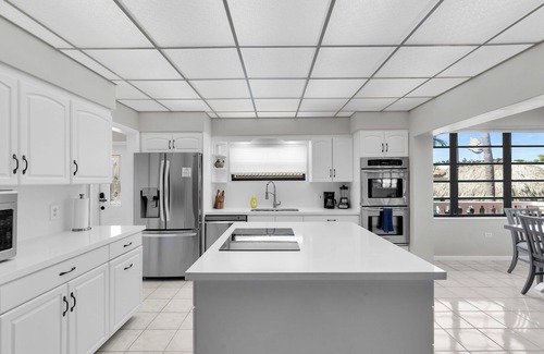 Coury House | Island Paradise-large 2 bedroom/2 bath SFH with Cabana club and 75ft of dockage