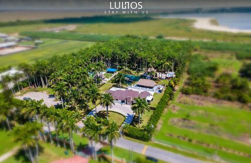 Ludlam House | Island Paradise - Pickleball, Football, Pool Bliss L61