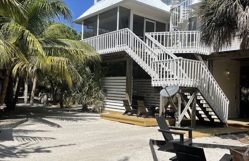 Jose's Hideaway House | Island Paradise: Steps to Private Gulf Beaches, Pools, Hot Tub & Golf Cart ALL