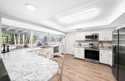 Villa De Palmas House | Island Paradise~ Heated Pool~ Family Fun~ Near Beach