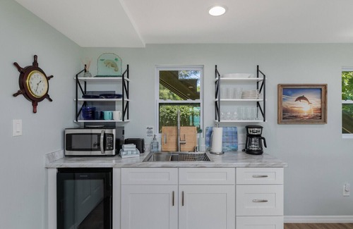 Grant-Valkaria House | Island waterfront getaway with sunset views from hot tub and boaters paradise!