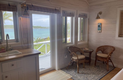 Dunmore Town Cottage | Islander Turtle Peek - Stunning new waterfront tiny-cottage overlooking harbour