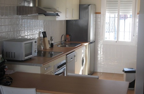 Islantilla Apartment | Islantilla: Islantilla, HUELVA Apartment home in the golf course, ideal for unwinding