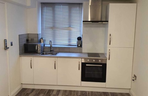 Belvedere Apartment | It a one bedroom studio apartment with a free parking and close to train station