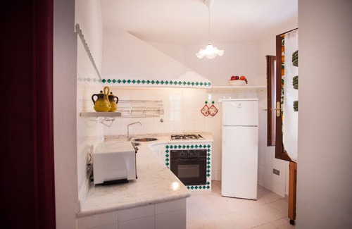 Cala Liberotto Apartment | PINE CONE DIRECT ACCESS TO THE BEACH (NO WIFI) CIN IT091063C2000S5156