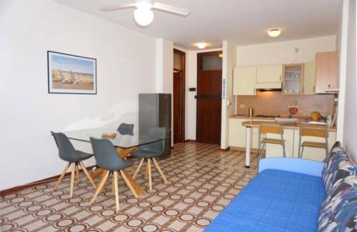 Porto Santa Margherita Apartment | Welcoming flat with charming pool view terrace