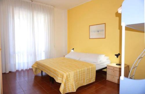 Porto Santa Margherita Apartment | Welcoming flat with charming pool view terrace