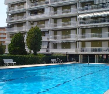 Porto Santa Margherita Apartment | Welcoming flat with charming pool view terrace