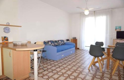 Porto Santa Margherita Apartment | Welcoming flat with charming pool view terrace