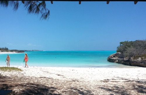 George Town Cottage | Ixora West - Views over Elizabeth harbor, beach access across the road.