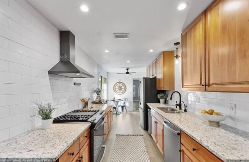 East Arlington House | Jacksonville Beach House Heated Pool 8 min to Hannah Park Beach Pet Friendly