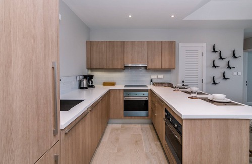 Calvigny Condo | Jade Stylish interior, Ocean Views, great amenities!