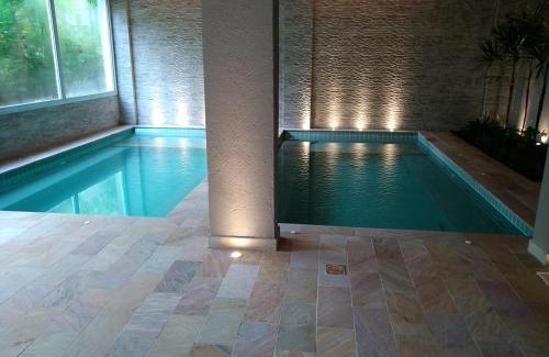 Estufa II Apartment | Jardim das Palmeiras II Home Resort - Imperdível - Vista Piscina - Suíte - Ubatuba