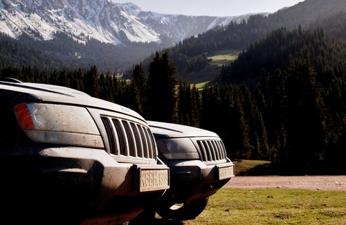 Bishkek House | Jeep with camping equipment
