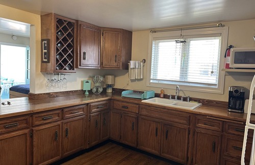 Ludington Apartment | Jimmy's Beach House "A" - 1/2 block to Ludington's City Beach Family unit.