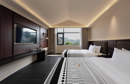 Jinghong Hotel | Jinghong Chen Duo Nan Shan Man Zhen