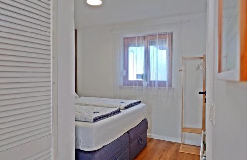 Burghausen Apartment | JIRVISTA-Homes, voll ausgestattete Wohnung im EG, kontaktloser Zutritt