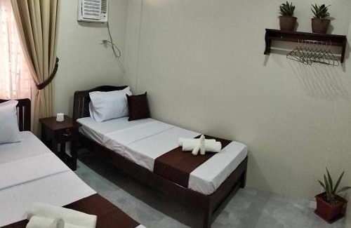 Puerto Princesa City Centre House | JMorino Pension House