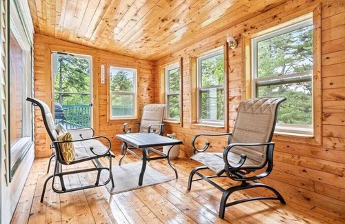 Aldersville Cottage | June's Haven" is a picturesque lakeside cottage perfect for fishing