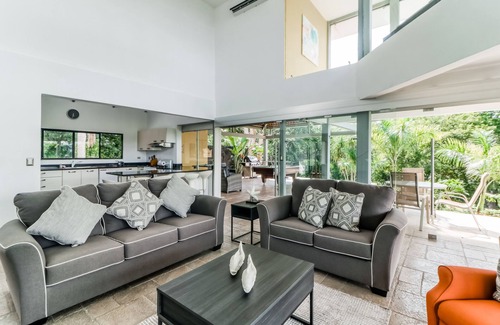 Tarcoles House | Jungle dog-friendly home with ocean views from the pool, gas grill & pool table