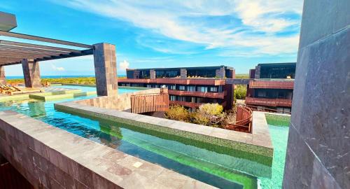 Playa Paraiso Apartment | Jungle Guardian - Rooftop Pool & Beach Club in Zona Hotelera Tulum
