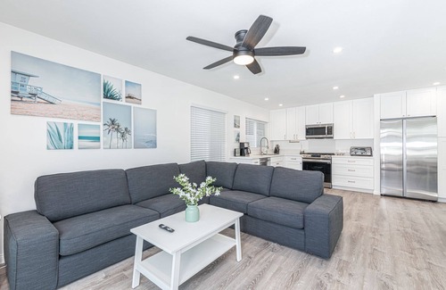 West Newport Condo | Just Listed! Clean, modern, bright, and only steps from the best beach in California!