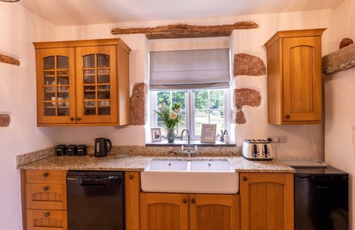 Ebford Cottage | Just outside Exeter, stunning views of Devon hills, estuary and the sea beyond.