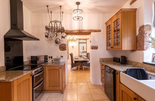 Ebford Cottage | Just outside Exeter, stunning views of Devon hills, estuary and the sea beyond.